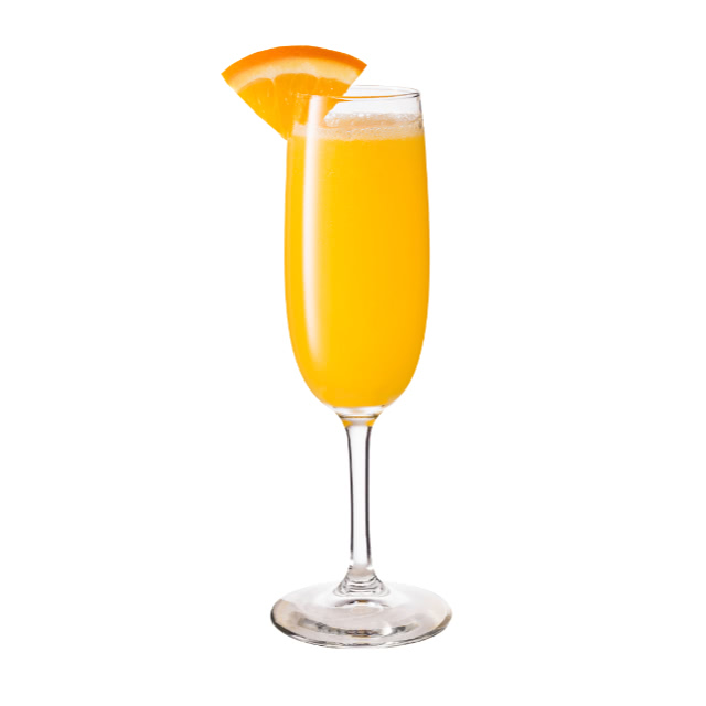 An orange color mimosa in a champagne glass